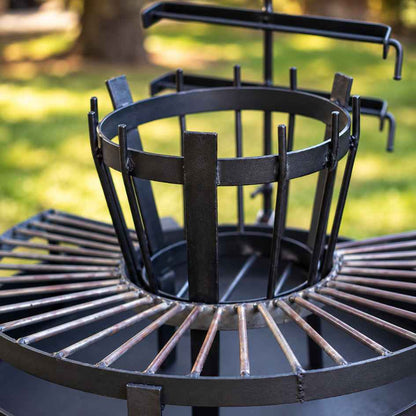 Detalle del Fogón Criollo 60: quemador central de varillas y parrilla circular de hierro